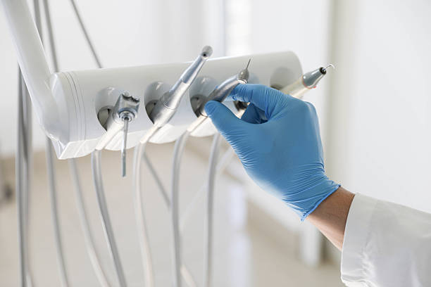 Professional Root Canal Treatment technician working in Questa, NM